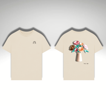 A flat image of the Men’s Oversized T-Shirt in Oat Beige with the “Love, Aya” logo on the left chest which features a black rainbow. Alongside it is the back of the product which features a large image of paper origami flowers in a vase.