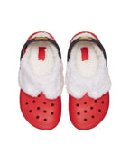 Top view of a pair of Kids Classic Lined Santa Clogs featuring red Croslite™ uppers and plush white fleece lining.