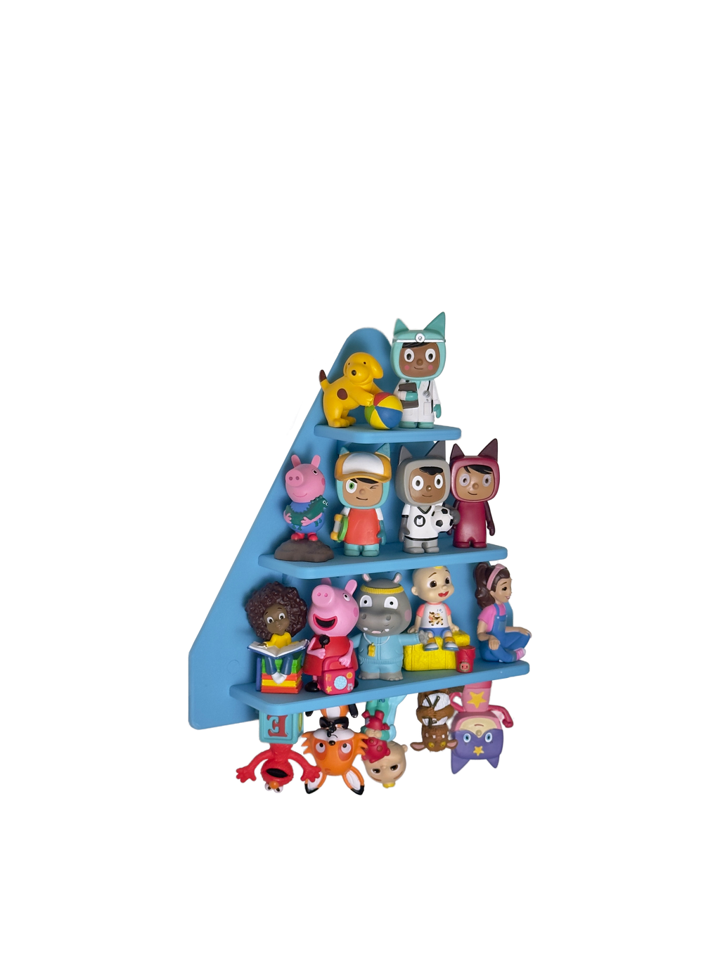 Set of colorful toy figures on a blue shelf against a white background