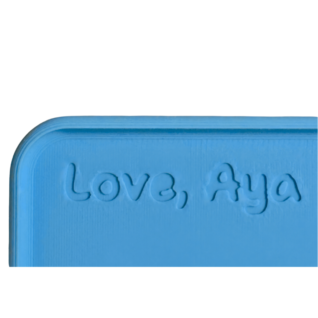 Blue product with 'Love, Aya' text on a white background